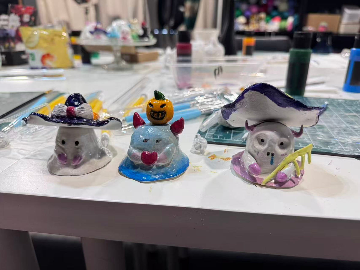 Colourful handmade Halloween clay ghosts