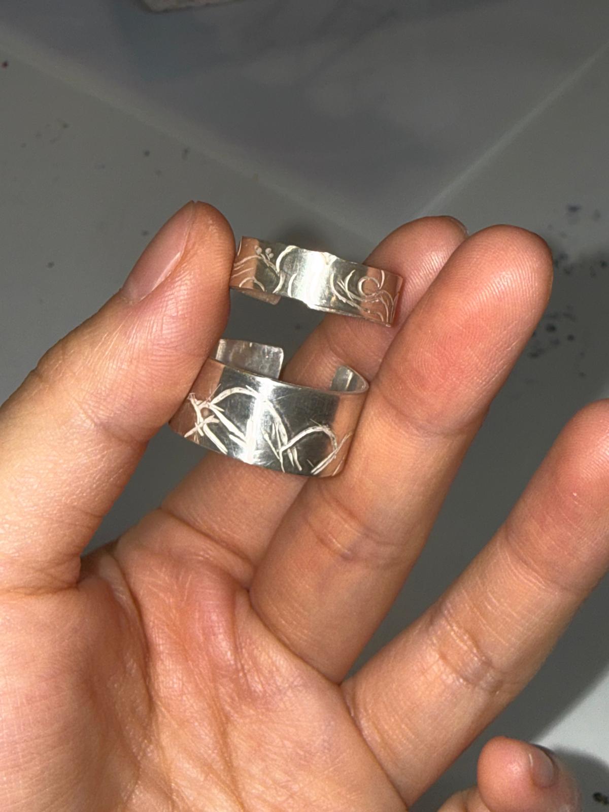 Handmade silver rings with personalised line patterns