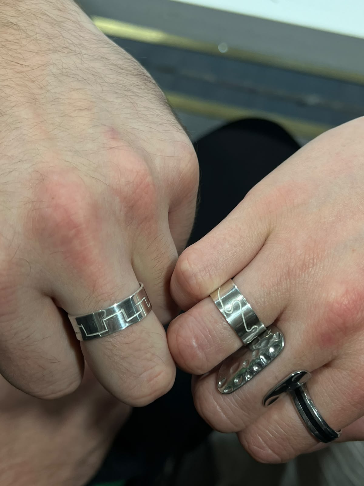 Personalised silver rings worn on hands
